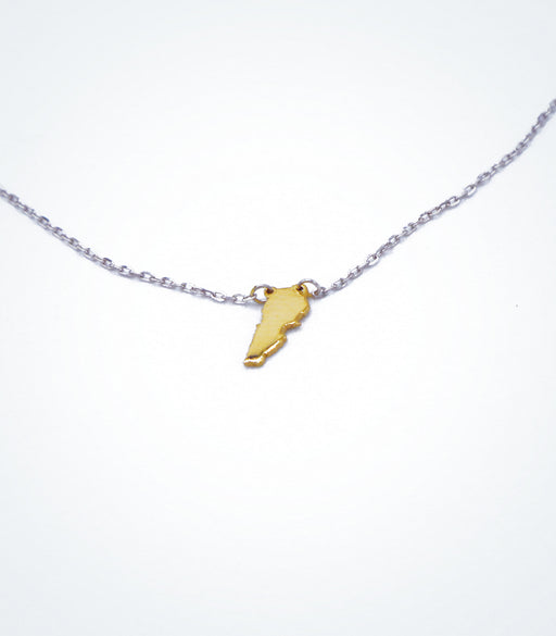 Yellow gold Map of Lebanon motif with a white gold chain necklace