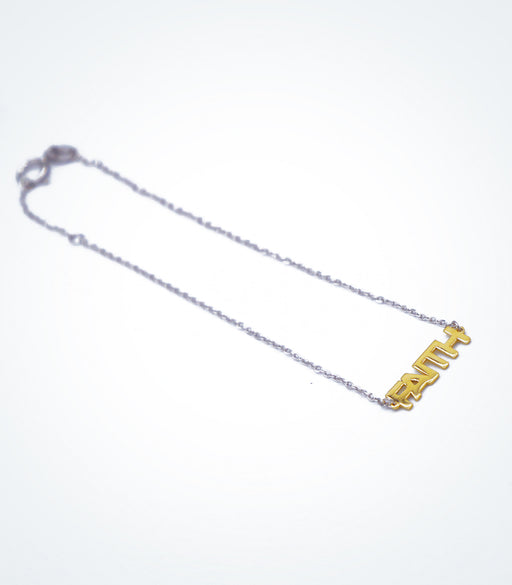 Yellow gold FAITH motif with a white gold chain bracelet