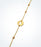 Yellow gold heart motif bracelet with gold ball bead accessorized on each side