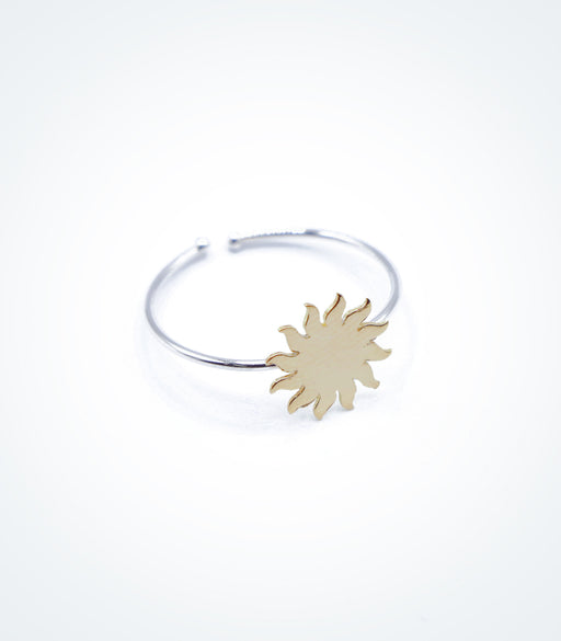 Yellow gold Sun motif on white gold ring wire