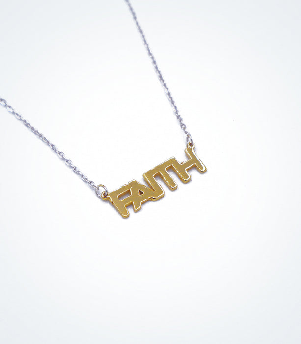 Yellow gold FAITH motif with a white gold chain necklace