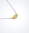 Yellow gold Evil Eye motif with a white gold chain necklace