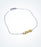 Yellow gold LOVE motif with a white gold chain bracelet