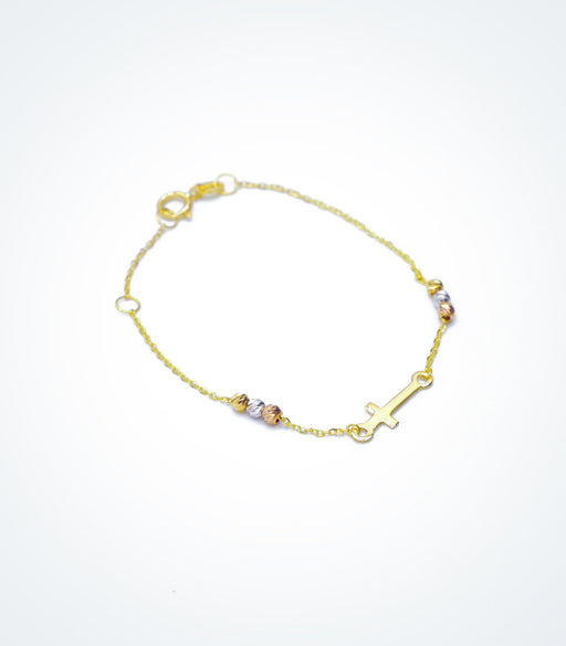 Yellow gold bracelet with a small Cross and colored ball beads