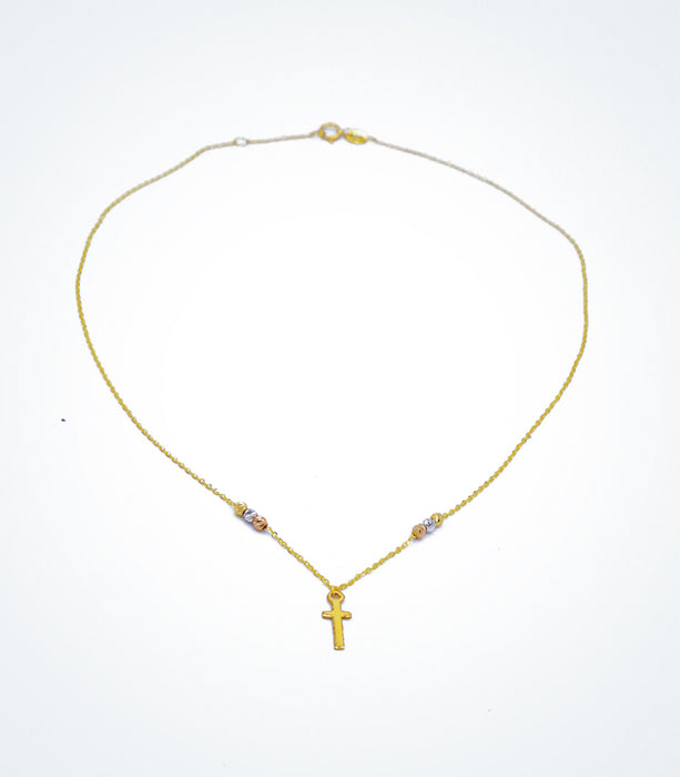 Yellow gold children's necklace with a small cross and colored gold ball beads
